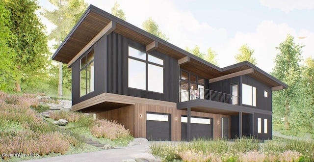292 Fairway View Dr, Sandpoint, ID 83864 - view of property exterior featuring a balcony and an attached garage