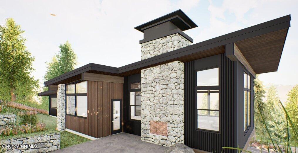 292 Fairway View Dr, Sandpoint, ID 83864 - view of exterior entry featuring stone siding