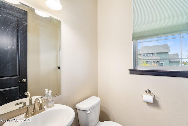 4631 E Alopex Ln, Post Falls, ID 83854 - bathroom with toilet and a sink