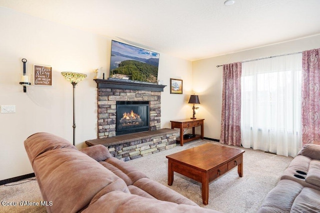 4631 E Alopex Ln, Post Falls, ID 83854 - carpeted living room featuring a fireplace and baseboards