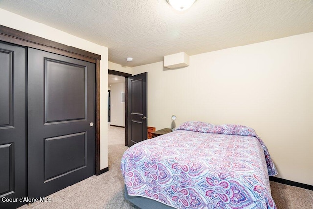 4631 E Alopex Ln, Post Falls, ID 83854 - carpeted bedroom with a textured ceiling and baseboards