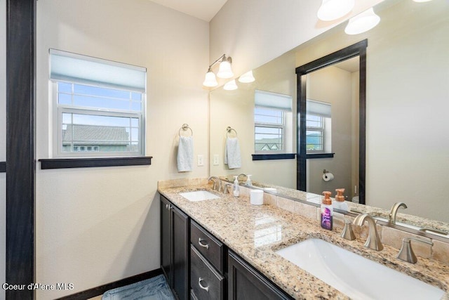 4631 E Alopex Ln, Post Falls, ID 83854 - full bath featuring double vanity and baseboards