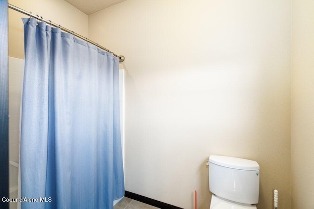 4631 E Alopex Ln, Post Falls, ID 83854 - bathroom with toilet and curtained shower