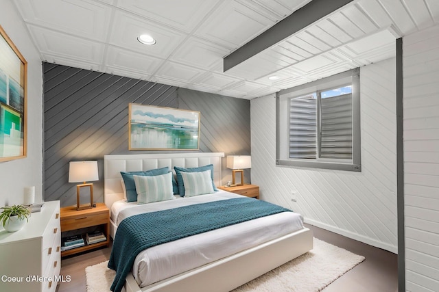 bedroom with recessed lighting, wood walls, wood finished floors, and an ornate ceiling