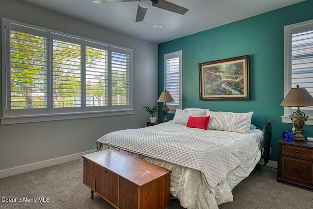 511 University Park Way, Sandpoint, ID 83864 - carpeted bedroom with baseboards and a ceiling fan