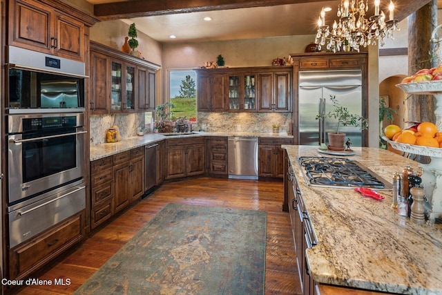 16829 S Lazurite Dr, Coeur Dalene, ID 83814 - kitchen with a warming drawer, stainless steel appliances, backsplash, a sink, and recessed lighting