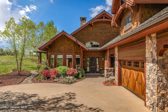 16829 S Lazurite Dr, Coeur Dalene, ID 83814 - rear view of house featuring a chimney