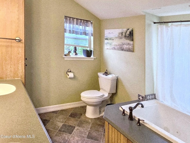 29429 N Silver Meadows Loop, Athol, ID 83801 - bathroom with toilet, a sink, lofted ceiling, a bath, and tile patterned floors