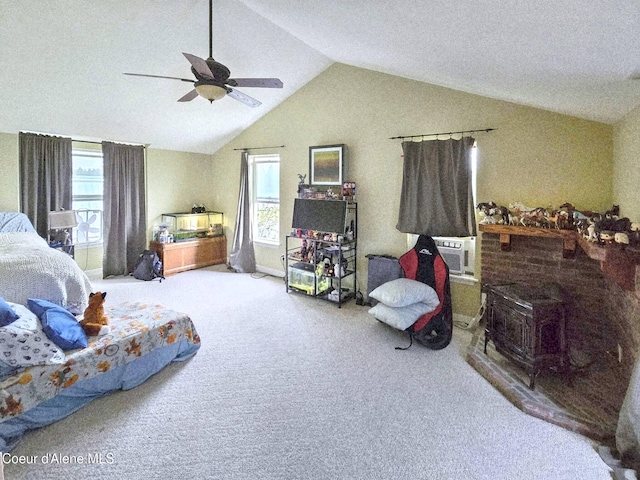 29429 N Silver Meadows Loop, Athol, ID 83801 - bedroom with lofted ceiling, carpet flooring, a wood stove, a ceiling fan, and cooling unit