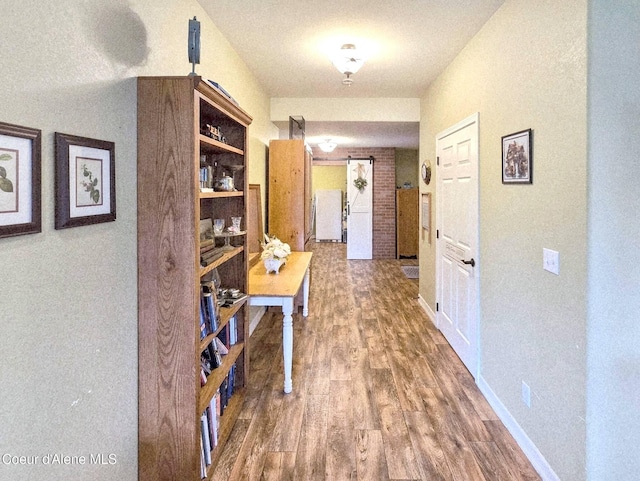 29429 N Silver Meadows Loop, Athol, ID 83801 - hall featuring wood finished floors and baseboards