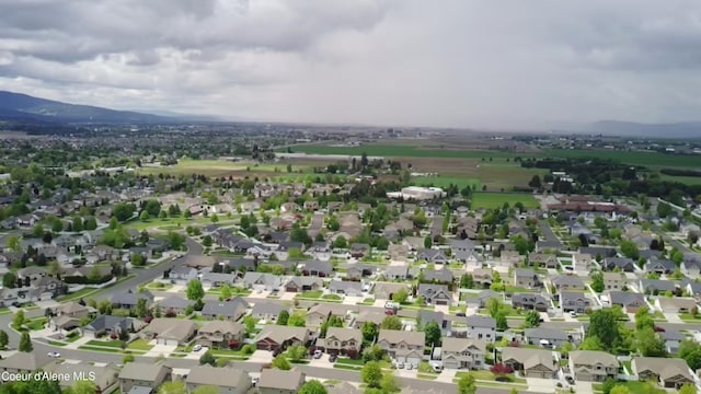 aerial perspective of suburban area with mountains