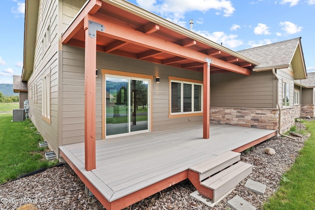24 Bellflower Ct, Blanchard, ID 83804 - deck featuring central AC and a yard