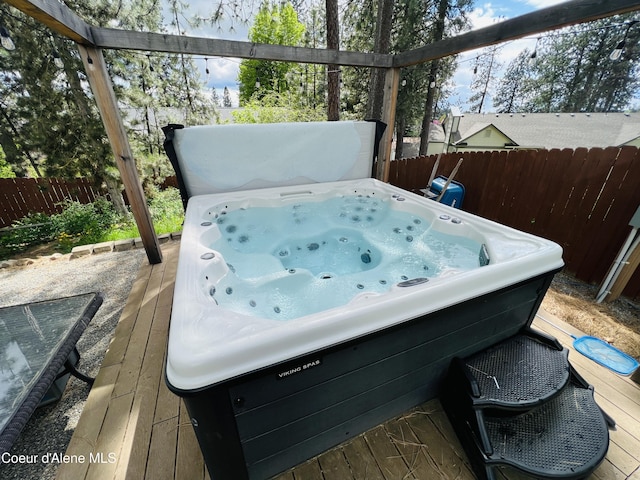 8351 N Audubon Dr, Hayden, ID 83835 - deck with a hot tub and fence