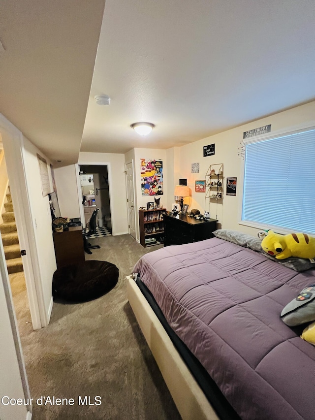 8351 N Audubon Dr, Hayden, ID 83835 - carpeted bedroom featuring baseboards