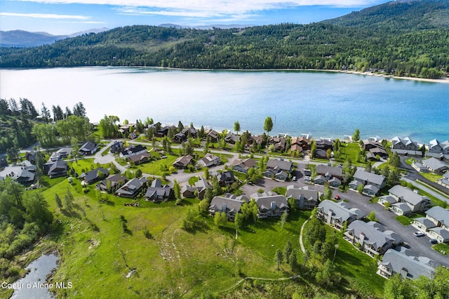 500 Guthrie Pl Unit 1303, Dover, ID 83825 - aerial perspective of suburban area featuring a heavily wooded area and a water and mountain view