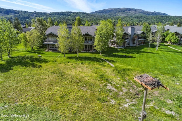 500 Guthrie Pl Unit 1303, Dover, ID 83825 - view of green lawn with a mountain view, a wooded view, and a residential view