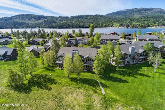 500 Guthrie Pl Unit 1303, Dover, ID 83825 - aerial perspective of suburban area featuring a heavily wooded area and a water and mountain view