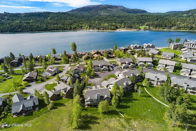 500 Guthrie Pl Unit 1303, Dover, ID 83825 - aerial view of property and surrounding area with a heavily wooded area, nearby suburban area, and a water and mountain view