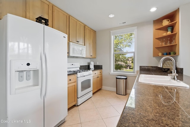 500 Guthrie Pl Unit 1303, Dover, ID 83825 - kitchen featuring white appliances, a sink, open shelves, tile counters, and light tile patterned flooring