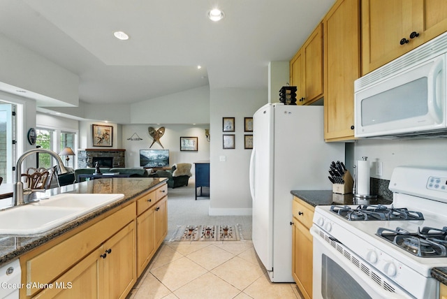 500 Guthrie Pl Unit 1303, Dover, ID 83825 - kitchen with white appliances, a sink, a fireplace, light carpet, and open floor plan