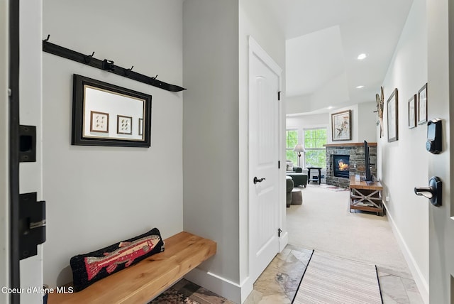 500 Guthrie Pl Unit 1303, Dover, ID 83825 - mudroom with baseboards, light marble finish floors, recessed lighting, a fireplace, and light colored carpet