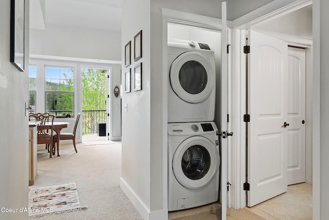 500 Guthrie Pl Unit 1303, Dover, ID 83825 - laundry room featuring stacked washer / dryer and light carpet