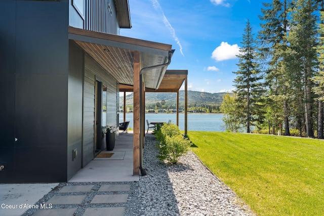 55 S Thistle Down Ln, Laclede, ID 83841 - view of green lawn with a water and mountain view