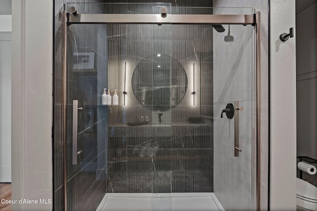 55 S Thistle Down Ln, Laclede, ID 83841 - full bathroom featuring a stall shower and toilet