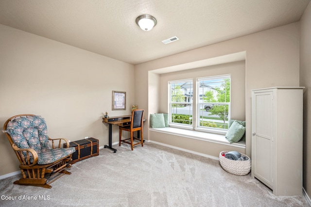 office area with carpet flooring and baseboards