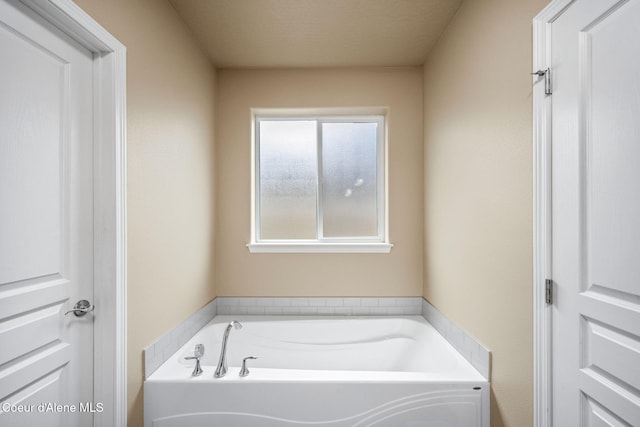 full bathroom with a garden tub