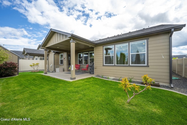 back of house with a patio area