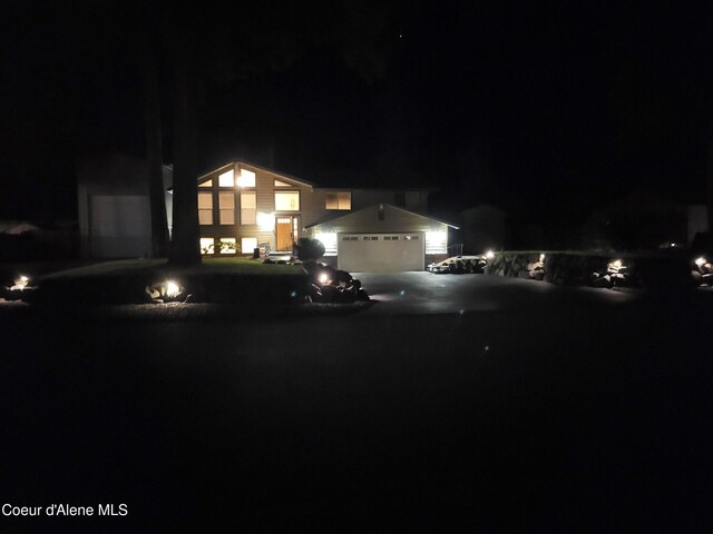 view of front of home with a garage and driveway