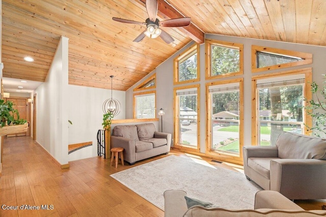 living room with wooden ceiling, a ceiling fan, wood-type flooring, high vaulted ceiling, and beam ceiling