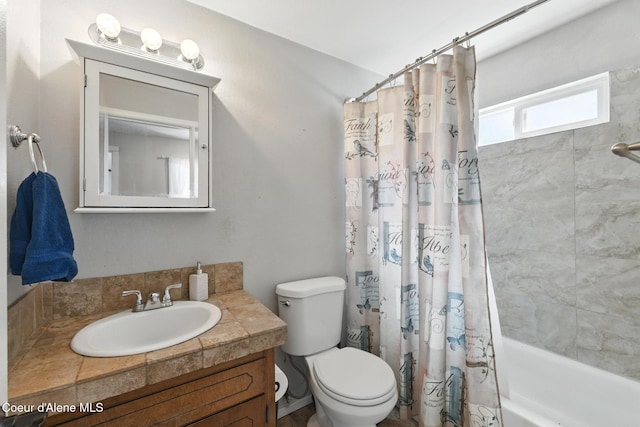 6699 Colburn Culver Rd, Sandpoint, ID 83864 - bathroom featuring vanity, shower / bath combination with curtain, and toilet