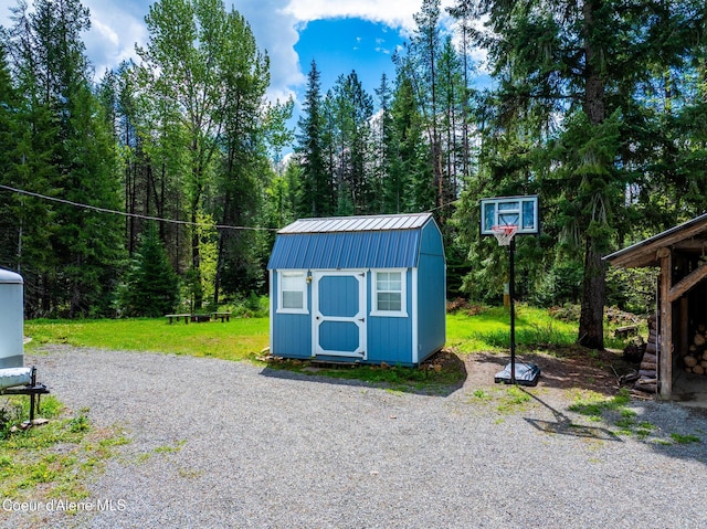 6699 Colburn Culver Rd, Sandpoint, ID 83864 - view of shed with a wooded view