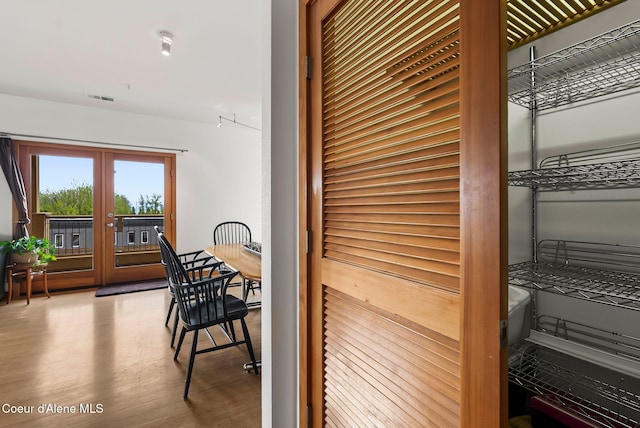 detailed view of french doors and wood finished floors