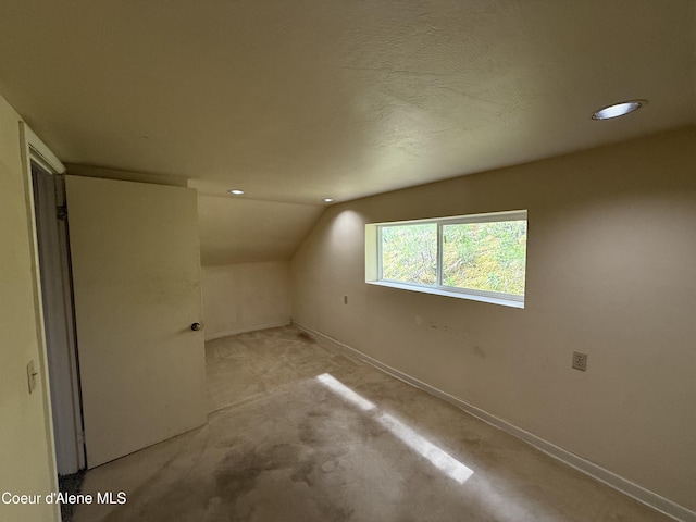 812 Silver St, Wallace, ID 83873 - bonus room with recessed lighting, vaulted ceiling, and baseboards