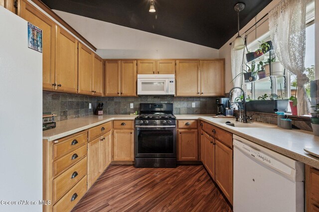 kitchen featuring white appliances, a sink, dark wood-style floors, light countertops, and tasteful backsplash