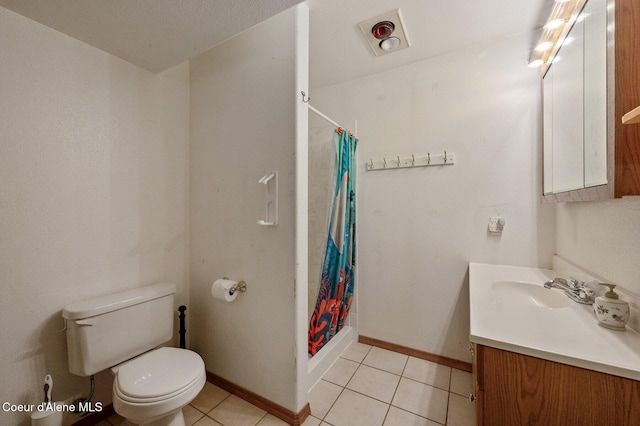 full bathroom with a shower with shower curtain, toilet, baseboards, vanity, and tile patterned floors