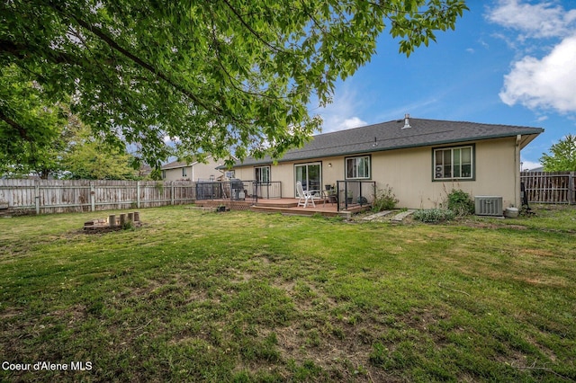 back of property featuring a wooden deck and central air condition unit
