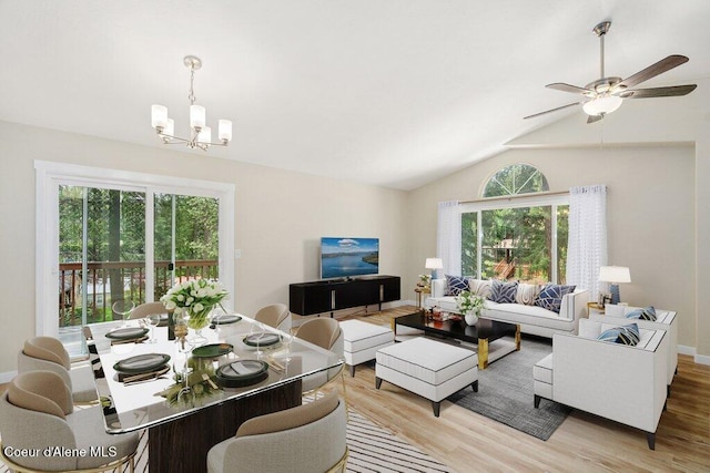 8694 N Clarkview Pl, Hayden Lake, ID 83835 - living area featuring healthy amount of natural light, a chandelier, light wood-style floors, and lofted ceiling