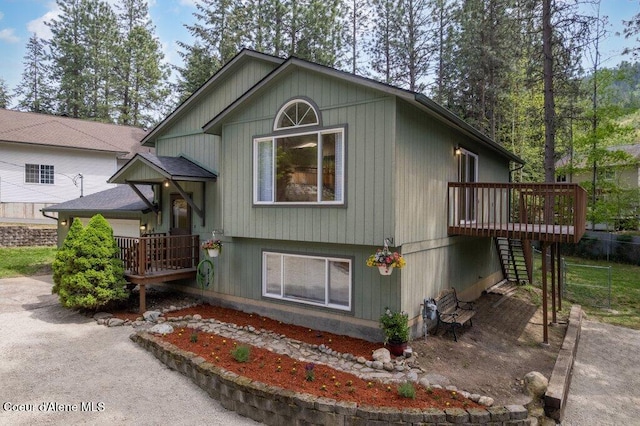 8694 N Clarkview Pl, Hayden Lake, ID 83835 - view of front of house with stairs and a deck