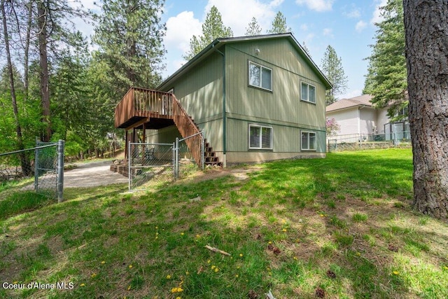 8694 N Clarkview Pl, Hayden Lake, ID 83835 - rear view of house with a wooden deck and stairs