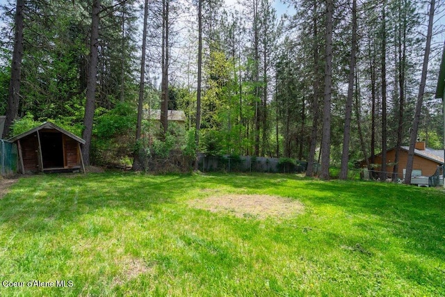 8694 N Clarkview Pl, Hayden Lake, ID 83835 - view of yard with a shed and an outbuilding