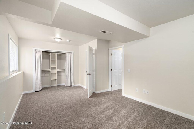 8694 N Clarkview Pl, Hayden Lake, ID 83835 - unfurnished bedroom featuring carpet, baseboards, and a closet