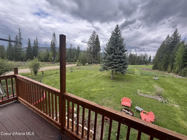 deck featuring a lawn