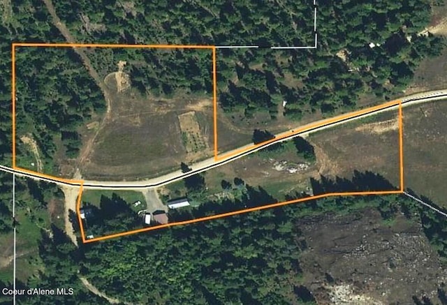 aerial overview of property's location featuring property parcel outlined