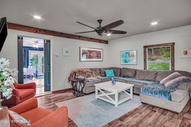 living room with ceiling fan, wood finished floors, recessed lighting, and baseboards