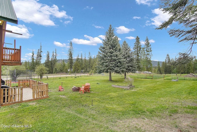 view of yard with a deck