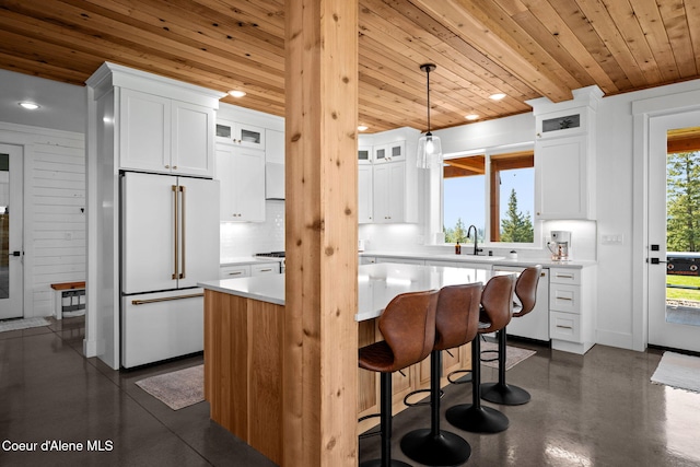 3298 W Coon Creek Rd, Plummer, ID 83851 - kitchen featuring high end fridge, dishwashing machine, wooden ceiling, a sink, and a center island